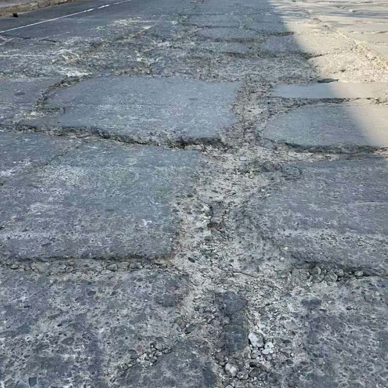新青路面起砂露石子修补料